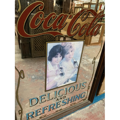 626 - A vintage framed Coca-Cola advertising wall mirror - approx. 99cm high x 73cm wide