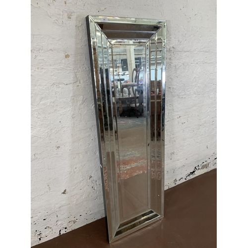 663 - A modern bevelled edge all hanging mirror - approx. 150cm high x 50cm wide