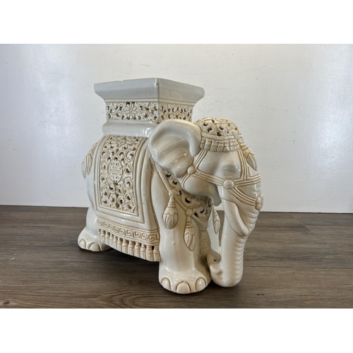 394 - A ceramic elephant jardinière stand - approx. 41cm high