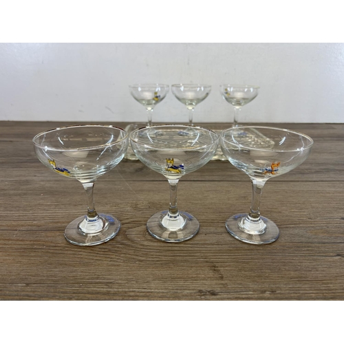 405 - Seven pieces of glassware, six Babycham advertising glasses and one tray