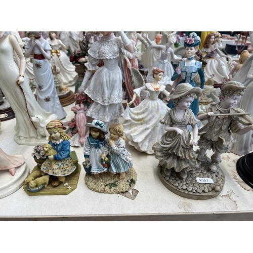 417 - A collection of resin and ceramic figurines to include Leonardo, The Juliana Collection etc.