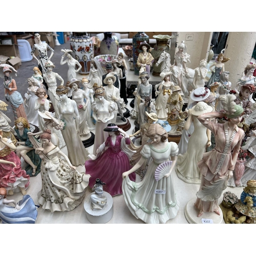 417 - A collection of resin and ceramic figurines to include Leonardo, The Juliana Collection etc.