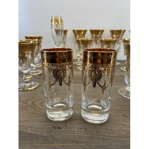 420 - A collection of Italian Interglass gilt decorated glassware together with one Baccarat France gilt d... 