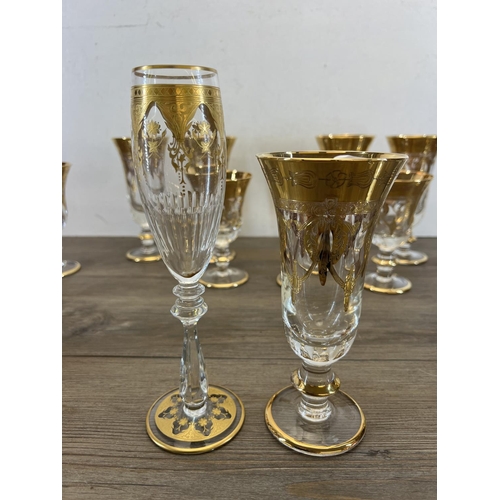 420 - A collection of Italian Interglass gilt decorated glassware together with one Baccarat France gilt d... 