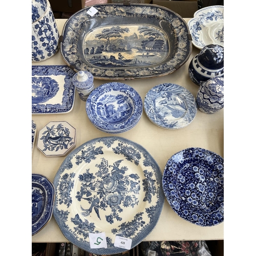 428 - A collection of blue and white ceramics to include four Copeland Spode's Italian bowls, meat plates,... 