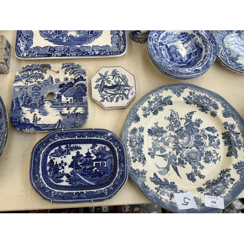 428 - A collection of blue and white ceramics to include four Copeland Spode's Italian bowls, meat plates,... 