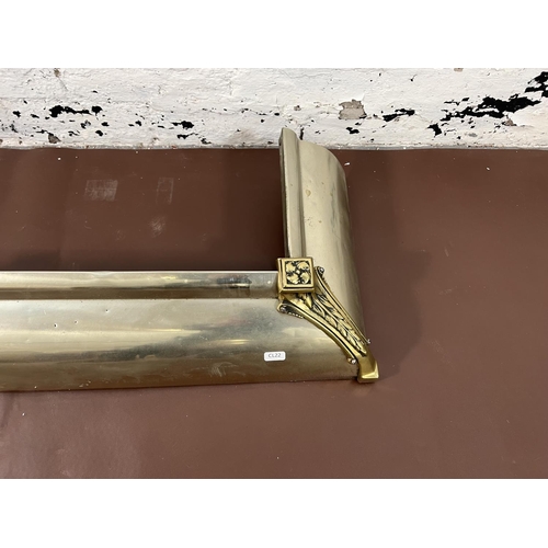 430 - A 19th century style brass and aluminium fire fender - approx. 124cm long