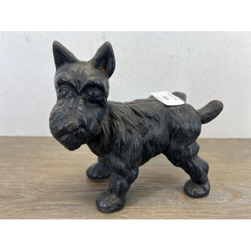 433 - A 19th century style cast iron scottie dog figurine