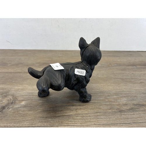 433 - A 19th century style cast iron scottie dog figurine