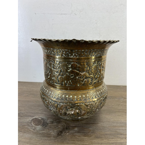 438 - A 19th century Indian hand embossed planter - approx. 24cm high x 25cm diameter