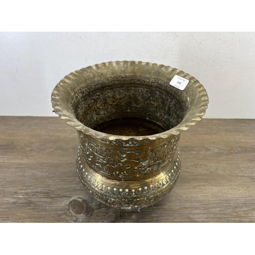 438 - A 19th century Indian hand embossed planter - approx. 24cm high x 25cm diameter