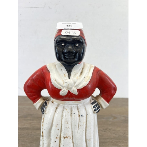 439 - A vintage hand-painted cast iron Aunt Jemima money bank - approx. 26cm high