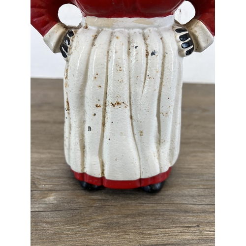 439 - A vintage hand-painted cast iron Aunt Jemima money bank - approx. 26cm high