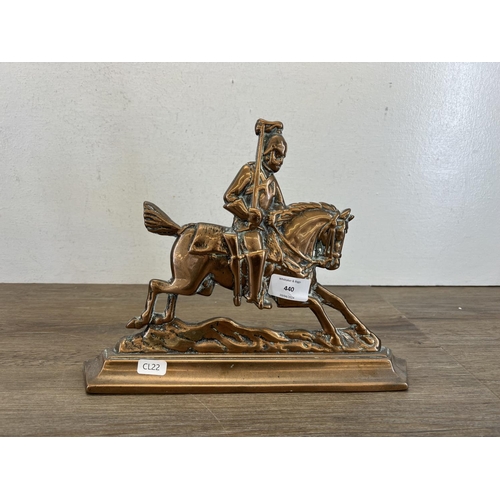 440 - A pair of 19th century brass Cavalrymen chimney ornaments - approx. 24cm high x 32cm wide