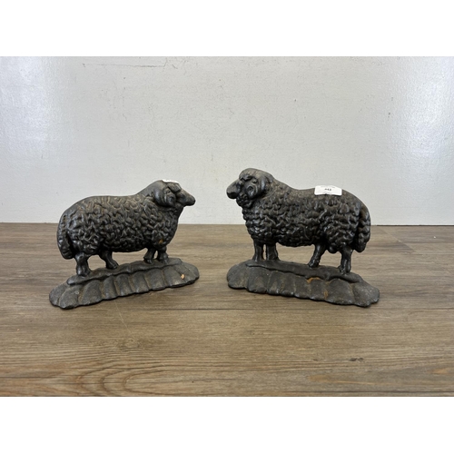 443 - A pair of 19th century style cast iron ram doorstops - approx. 19cm high x 24cm long