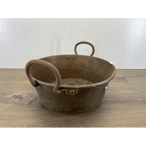 446 - A 19th century copper two handled preserve pan - approx. 23cm high x 36.5 cm diameter