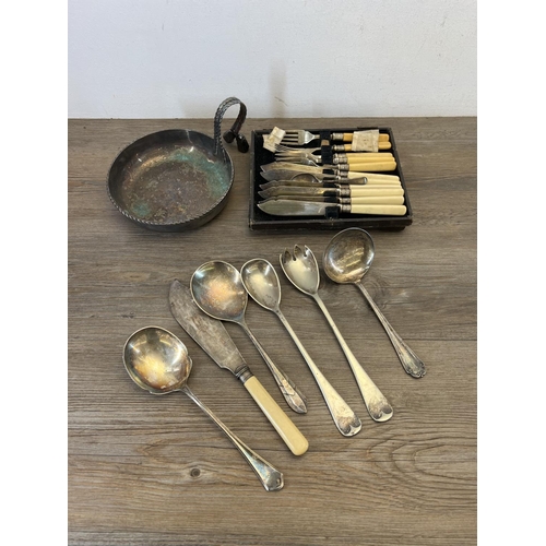 465 - A collection of vintage metalware to include cutlery, brass two handled inkwell with Greek key patte... 