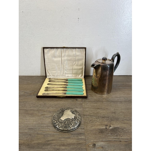 465 - A collection of vintage metalware to include cutlery, brass two handled inkwell with Greek key patte... 