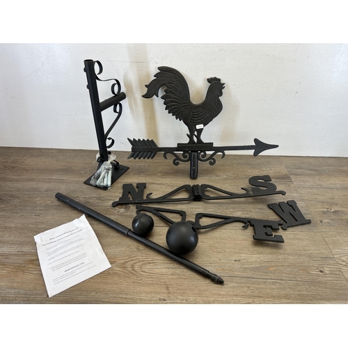 467 - A modern Black Country Metal Works Ltd. cast and wrought iron cockerel weathervane