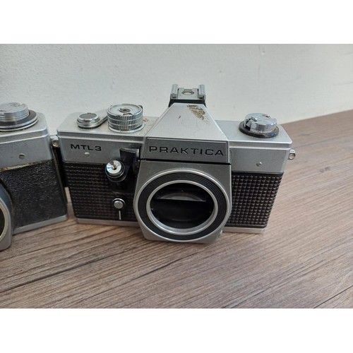 681 - Nine 35mm SLR camera bodies, eight Praktica and one Prinzflex 500E