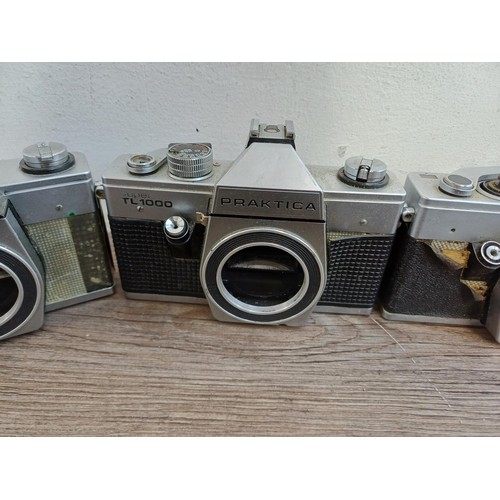 681 - Nine 35mm SLR camera bodies, eight Praktica and one Prinzflex 500E