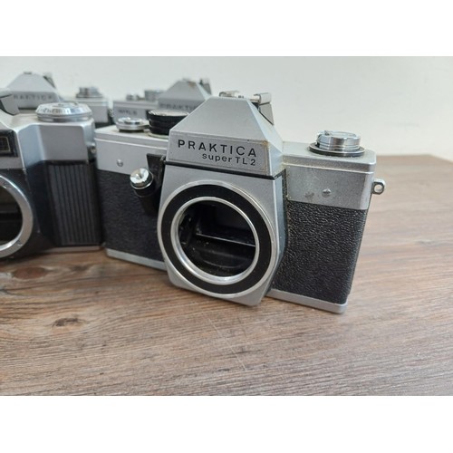 681 - Nine 35mm SLR camera bodies, eight Praktica and one Prinzflex 500E