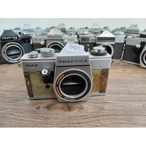 681 - Nine 35mm SLR camera bodies, eight Praktica and one Prinzflex 500E