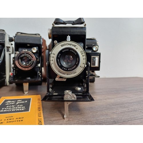 682 - Seven vintage cameras to include cased Zeiss Ikon Nettar 510/2 folding for 120 film, boxed Kodak Six... 