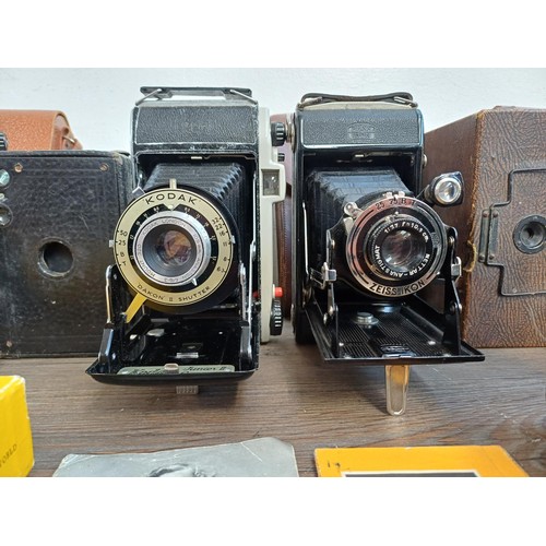 682 - Seven vintage cameras to include cased Zeiss Ikon Nettar 510/2 folding for 120 film, boxed Kodak Six... 