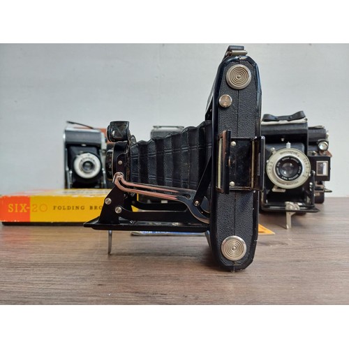 682 - Seven vintage cameras to include cased Zeiss Ikon Nettar 510/2 folding for 120 film, boxed Kodak Six... 