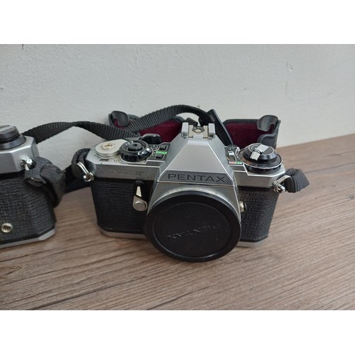 684 - Seven Pentax items to include cased K2 35mm SLR camera fitted with Pentax 1:1.2 50mm lens, ME F 35mm... 