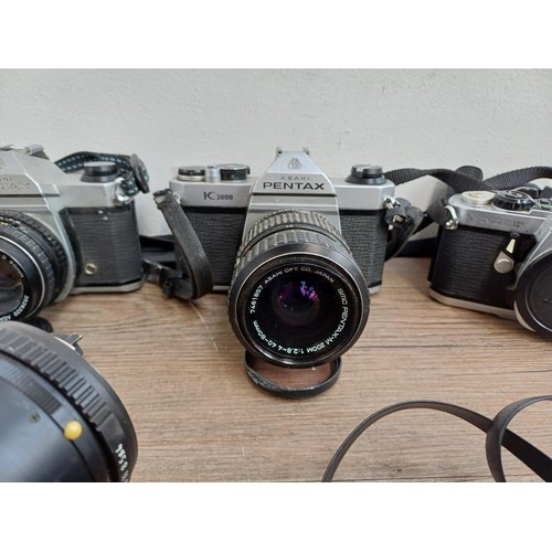 684 - Seven Pentax items to include cased K2 35mm SLR camera fitted with Pentax 1:1.2 50mm lens, ME F 35mm... 