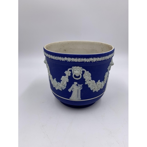 302 - An antique Wedgwood blue Jasperware planter - approx. 13cm high x 15cm diameter