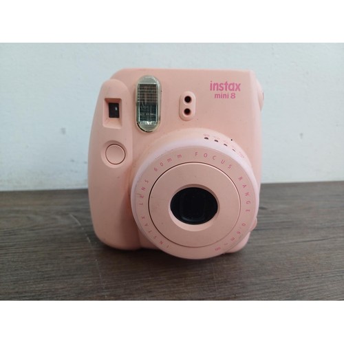 685 - Two Fujifilm Instax instant cameras, one 200 and one Mini 8 (A/F)