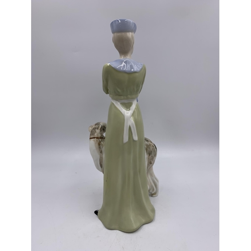 321 - A Royal Doulton Reflections Park Parade figurine - HN3116