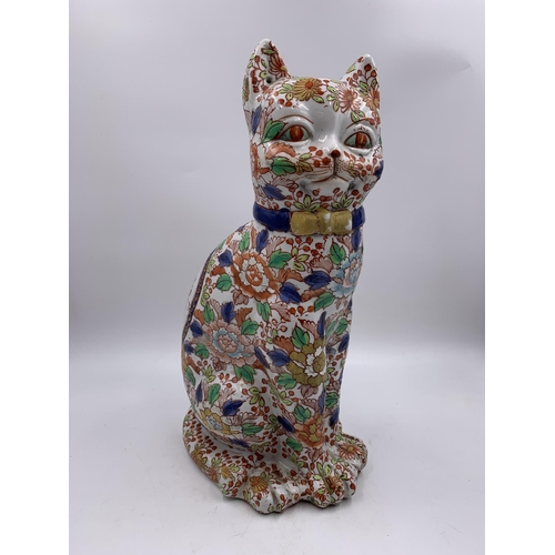 337 - An Imari porcelain cat figurine - approx. 36cm high