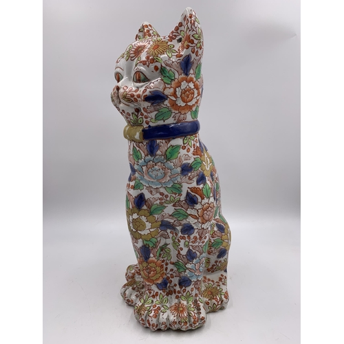 337 - An Imari porcelain cat figurine - approx. 36cm high