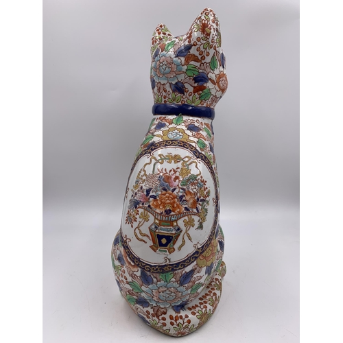 337 - An Imari porcelain cat figurine - approx. 36cm high