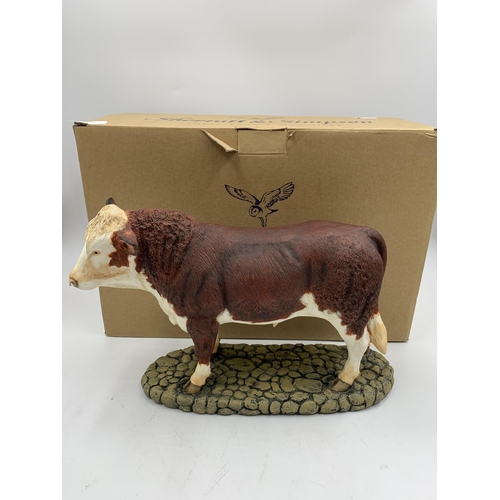 344 - A boxed Sherratt & Simpson Hereford Bull resin figurine - no. 57331