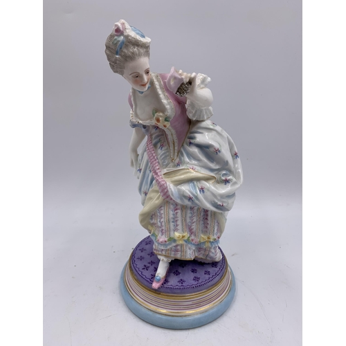 354 - A pair of 19th century hand painted porcelain figurines attributed to Vion Et Baury - approx. 25cm h... 