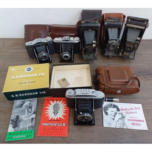 689 - A collection of folding cameras to include boxed G.B. Kershaw 110, cased Zeiss Ikon Nettar 517/16, K... 