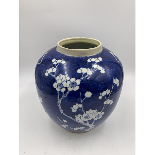 359 - A Chinese Prunus Blossom porcelain vase with character mark to base - approx. 22cm high