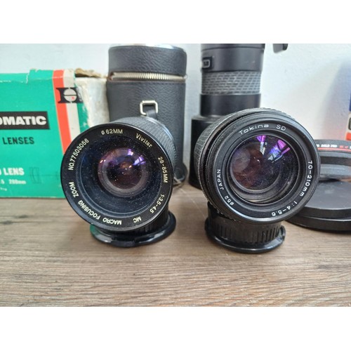 695 - A collection of tele-converters and lenses to include boxed Hanimar F:3.5 200m automatic telephoto f... 