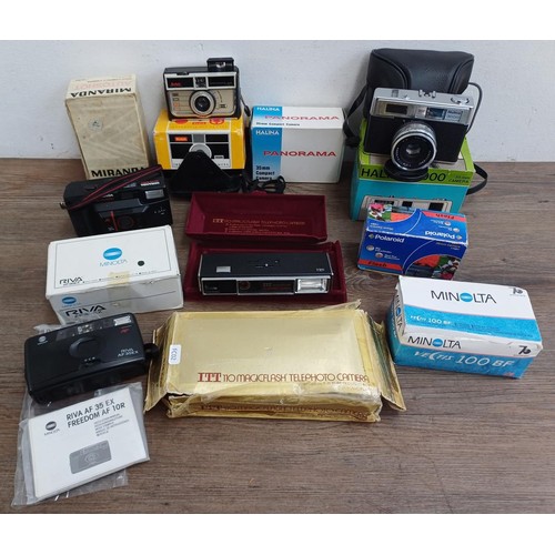 700 - A collection of boxed cameras to include Minolta Riva AF35EX, ITT MagicFlash, cased Halina 3000, Mir... 