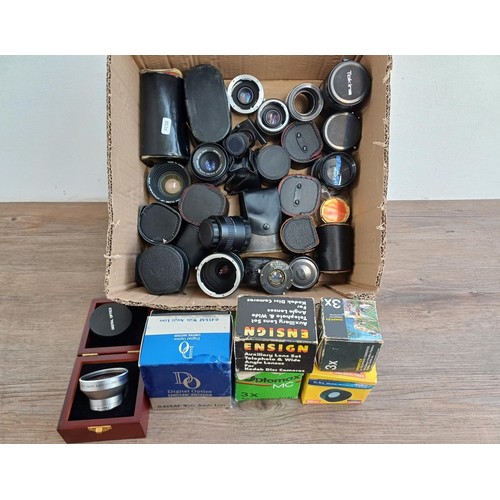 702 - A collection of tele-converters and lenses to include boxed and cased Digital Optics 0.45XXX Pro hig... 