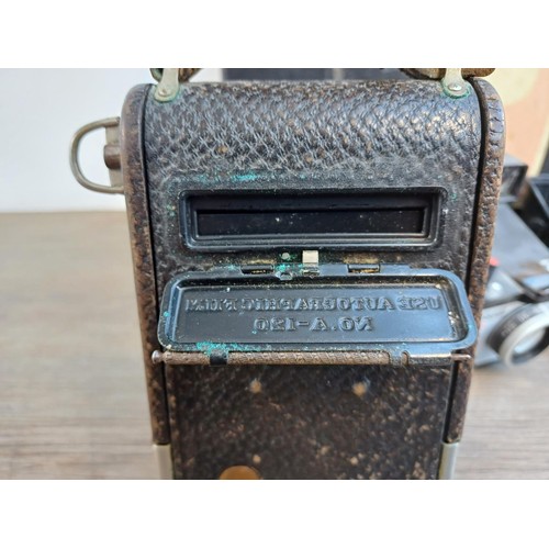 710 - Four items, one Kodak No.1 Autographic Jr. folding camera for 120 film, one cased Olympus AFL-T Quar... 