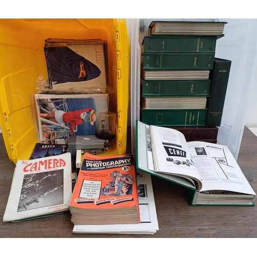 711 - Three boxes containing a large collection of photography magazines to include Leica Fotographia and ... 