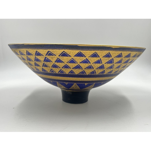 370 - A Mary Rich studio pottery circular footed fruit bowl on cobalt blue ground with gilt geometric patt... 