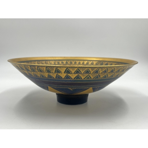 371 - A Mary Rich studio pottery circular footed bowl on teal and plum ground with gilt geometric pattern ... 