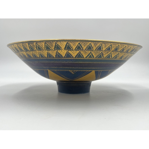 371 - A Mary Rich studio pottery circular footed bowl on teal and plum ground with gilt geometric pattern ... 